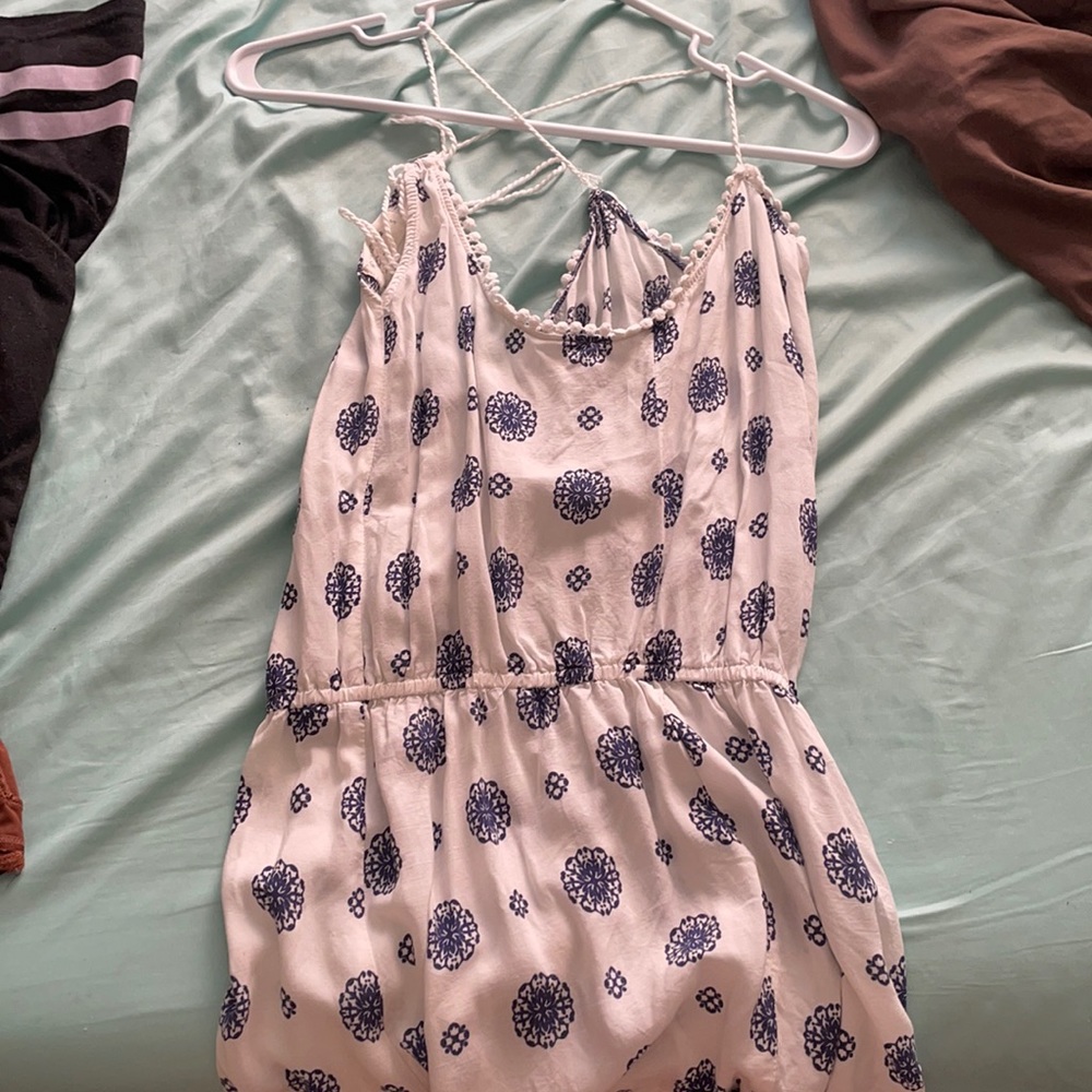 White romper, blue detailing